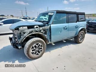 ✅ 2022 Ford Bronco • VIN: 1FMDE5DH2NLB76999 • Lot: 67113325. Wystawiony na Copart z przebiegiem 42 557 mil. Bezpłatny archiwum sprzedaży aukcyjnych z USA i szczegółowy raport historii pojazdu na DreamBid. Zdjęcie 1.