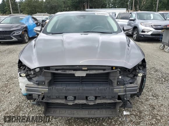 ✅ 2013 Ford Fusion Titanium Hybrid • VIN: 3FA6P0RU7DR345548 • Lot: 67648065. Wystawiony na Copart z przebiegiem 110 002 mil. Bezpłatny archiwum sprzedaży aukcyjnych z USA i szczegółowy raport historii pojazdu na DreamBid. Zdjęcie 5.