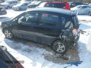 2005 Chevrolet Aveo LS z VIN KL1TD62625B481491, wystawiony jako IAAI lot #41345537 z przebiegiem 133 922 mil mil oraz . Historia ofert i sprzedaży dostępna na DreamBid. Obrazek 3.