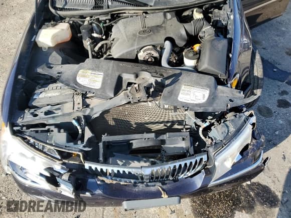 ✅ 1999 Lincoln Town Car Signature • VIN: 1LNHM82W9XY691057 • Lot: 90223875. Listed on Copart with 200,691 mi. Free auction sales archive from the USA and detailed vehicle history report at DreamBid. Image 11.