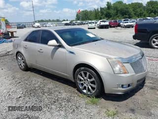 ✅ 2009 Cadillac CTS RWD • VIN: 1G6DV57VX90152644 • Lot: 42764767. Listed on IAAI with 184,144 mi. Free auction sales archive from the USA and detailed vehicle history report at DreamBid. Image 1.