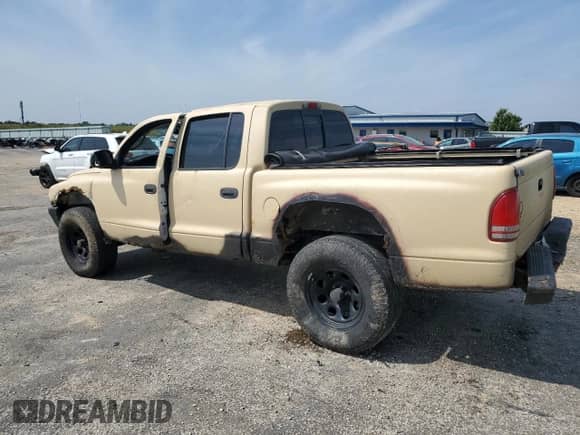 2004 Dodge Dakota Sport with VIN 1D7HG38N14S627273, listed as a Copart auction lot 67491104 with Not provided miles and Non repairable. Bid and sale history available at DreamBid. Image 2.