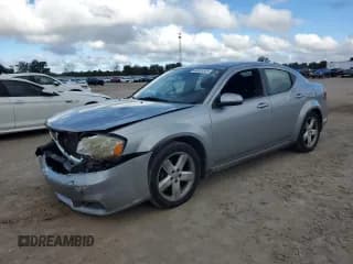 ✅ 2013 Dodge Avenger SXT • VIN: 1C3CDZCB2DN680323 • Lot: 84581575. Listed on Copart with 207,637 mi. Free auction sales archive from the USA and detailed vehicle history report at DreamBid. Image 1.