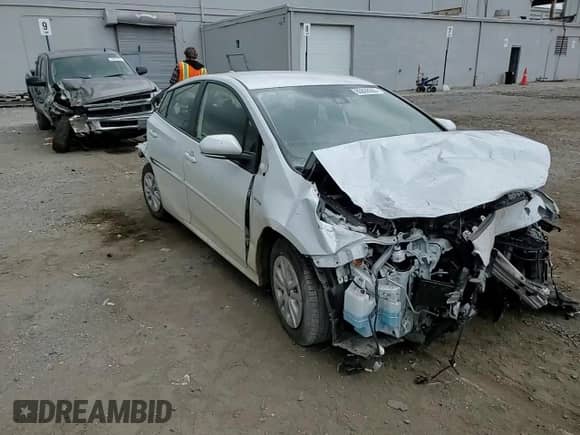 2022 Toyota Prius L Eco с VIN JTDKAMFUXN3175479, выставлен на аукционе Copart как лот 80868605 с пробегом Не указан миль и Списание • Salvage title. История ставок и продаж доступна на DreamBid. Изображение 13.