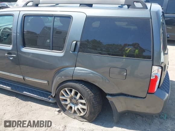 ✅ 2009 Nissan Pathfinder SE • VIN: 5N1AR18B39C615574 • Lot: 42802230. Listed on IAAI with 119,025 mi. Free auction sales archive from the USA and detailed vehicle history report at DreamBid. Image 6.