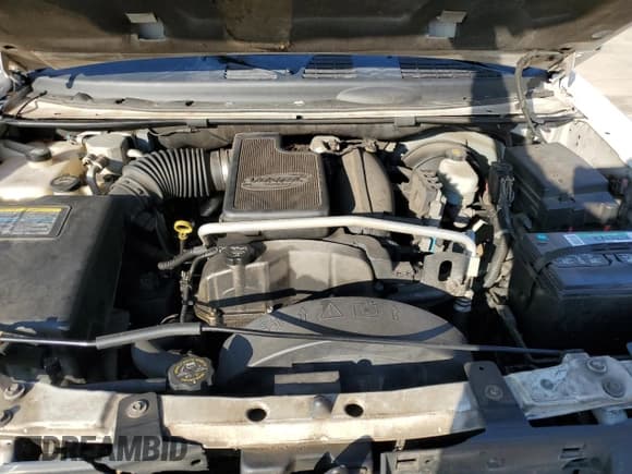 ✅ 2006 GMC Envoy SLE • VIN: 1GKES16SX66173565 • Лот: 43982355. Опубликован ранее на Copart с пробегом 297 894 миль. Бесплатный доступ к архиву аукционных продаж из США и подробный отчёт об истории автомобиля на DreamBid. Изображение 13.