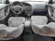 2002 Hyundai Elantra GLS z VIN KMHDN45D92U443650, wystawiony jako Copart lot #75556614 z przebiegiem 103 106 mil mil oraz Czysty tytuł • Clean title. Historia ofert i sprzedaży dostępna na DreamBid. Obrazek 8.