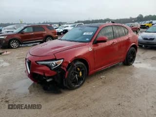 ✅ 2018 Alfa Romeo Stelvio • VIN: ZASFAKEV0J7C25297 • Lot: 43730035. Listed on Copart with 72,048 mi. Free auction sales archive from the USA and detailed vehicle history report at DreamBid. Image 1.