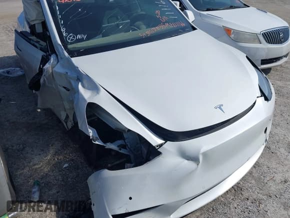 ✅ 2021 Tesla Model Y Standard Range • VIN: 5YJYGDED5MF111166 • Lot: 42395423. Listed on IAAI with Not provided. Free auction sales archive from the USA and detailed vehicle history report at DreamBid. Image 6.