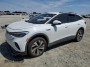 ✅ 2023 Volkswagen ID.4 Pro • VIN: 1V2DNPE87PC054087 • Лот: 58586555. Опубликован ранее на Copart с пробегом 19 806 миль. Бесплатный доступ к архиву аукционных продаж из США и подробный отчёт об истории автомобиля на DreamBid. Изображение 1.