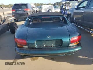 ✅ 1995 Dodge Viper • VIN: 1B3BR65E9SV201019 • Lot: 77252124. Listed on Copart with Not provided. Free auction sales archive from the USA and detailed vehicle history report at DreamBid. Image 6.