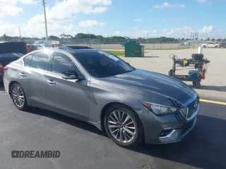 ✅ 2023 Infiniti Q50 Luxe • VIN: JN1EV7BP1PM510891 • Lot: 42535050. Listed on IAAI with 7,411 mi. Free auction sales archive from the USA and detailed vehicle history report at DreamBid. Image 1.