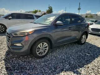 2016 Hyundai Tucson SE with VIN KM8J33A42GU225629, listed as a Copart auction lot 82594095 with 99,155 mi miles and Salvage title. Bid and sale history available at DreamBid. Image 1.