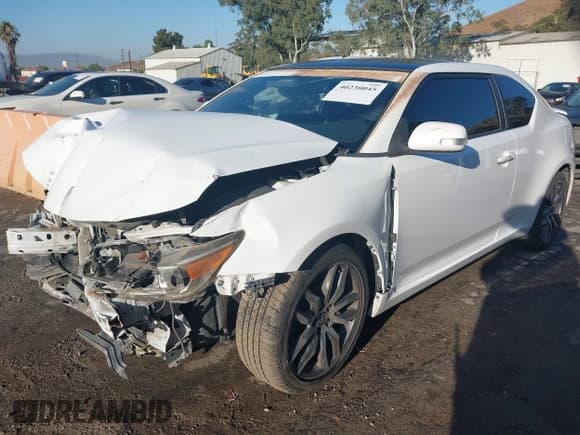 ✅ 2014 Scion tC • VIN: JTKJF5C70E3071934 • Лот: 40230045. Опубликован ранее на IAAI с пробегом 116 203 миль. Бесплатный доступ к архиву аукционных продаж из США и подробный отчёт об истории автомобиля на DreamBid. Изображение 2.