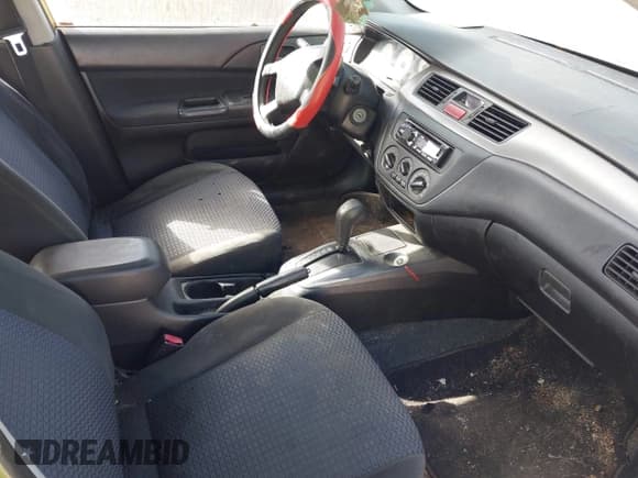 ✅ 2002 Mitsubishi Lancer OZ-Rally • VIN: JA3AJ86E72U062749 • Lot: 43702812. Listed on IAAI with 192,706 mi. Free auction sales archive from the USA and detailed vehicle history report at DreamBid. Image 5.