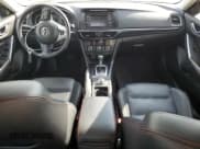 ✅ 2014 Mazda 6 i Grand Touring • VIN: JM1GJ1W6XE1156934 • Лот: 87245095. Опубликован ранее на Copart с пробегом 158 539 миль. Бесплатный доступ к архиву аукционных продаж из США и подробный отчёт об истории автомобиля на DreamBid. Изображение 8.