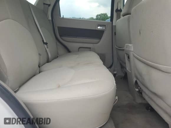 2011 Mercury Mariner z VIN 4M2CN8B71BKJ01749, wystawiony jako Copart lot #64199345 z przebiegiem 157 001 mil mil oraz Szkoda całkowita • Salvage title. Historia ofert i sprzedaży dostępna na DreamBid. Obrazek 11.