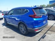 ✅ 2020 Honda CR-V Touring • VIN: 7FARW1H97LE011473 • Lot: 42368050. Listed on IAAI with 84,425 mi. Free auction sales archive from the USA and detailed vehicle history report at DreamBid. Image 3.