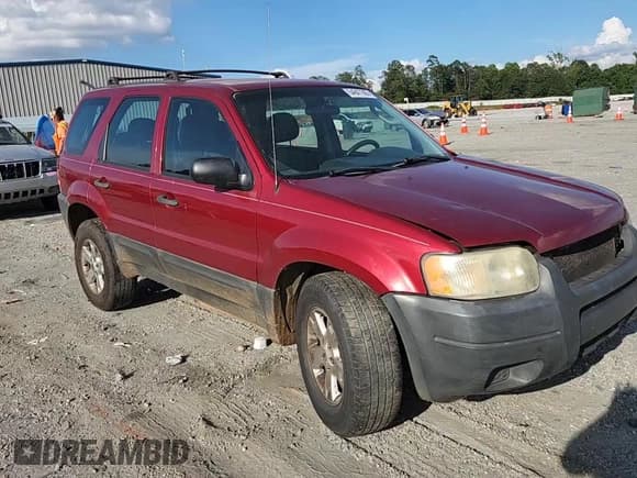 ✅ 2004 Ford Escape XLS • VIN: 1FMYU02154DA11034 • Lot: 64847905. Listed on Copart with Not provided. Free auction sales archive from the USA and detailed vehicle history report at DreamBid. Image 13.