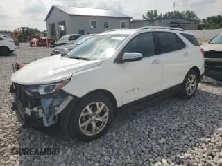 ✅ 2019 Chevrolet Equinox Premier • VIN: 2GNAXNEV8K6220926 • Лот: 64214765. Опубликован ранее на Copart с пробегом 131 046 миль. Бесплатный доступ к архиву аукционных продаж из США и подробный отчёт об истории автомобиля на DreamBid. Изображение 1.