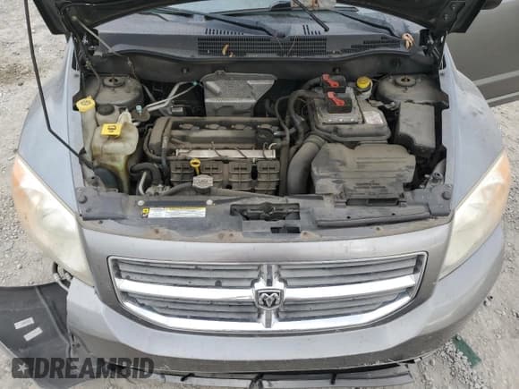 ✅ 2012 Dodge Caliber SXT • VIN: 1C3CDWDA0CD532017 • Лот: 78232774. Опубликован ранее на Copart с пробегом 77 077 миль. Бесплатный доступ к архиву аукционных продаж из США и подробный отчёт об истории автомобиля на DreamBid. Изображение 11.