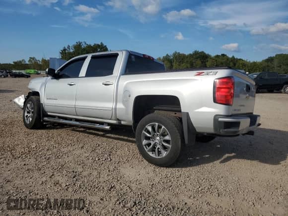 2018 Chevrolet Silverado 1500 LT с VIN 3GCUKREC4JG638977, выставлен на аукционе Copart как лот 80853665 с пробегом Не указан миль и Списание • Salvage title. История ставок и продаж доступна на DreamBid. Изображение 2.