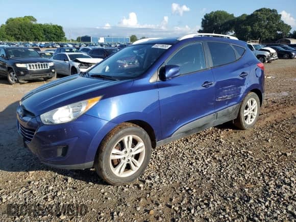 2011 Hyundai Tucson GLS z VIN KM8JUCAC4BU174888, wystawiony jako Copart lot #63278655 z przebiegiem 156 034 mil mil oraz Szkoda całkowita • Salvage title. Historia ofert i sprzedaży dostępna na DreamBid. Obrazek 1.