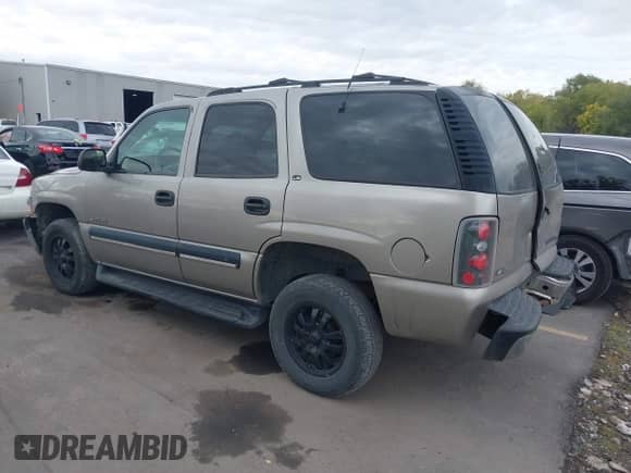 2001 Chevrolet Tahoe LT with VIN 1GNEK13T71J239513, listed as a IAAI auction lot 43437806 with 216,160 mi miles and . Bid and sale history available at DreamBid. Image 3.