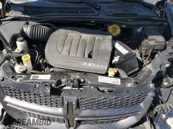 ✅ 2018 Dodge Grand Caravan GT • VIN: 2C4RDGEG5JR140594 • Lot: 48394125. Listed on Copart with 125,515 mi. Free auction sales archive from the USA and detailed vehicle history report at DreamBid. Image 12.