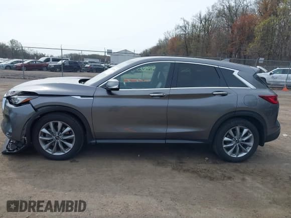 ✅ 2022 Infiniti QX50 Pure • VIN: 3PCAJ5ABXNF115938 • Lot: 41922598. Wystawiony na IAAI z przebiegiem 25 509 mil. Bezpłatny archiwum sprzedaży aukcyjnych z USA i szczegółowy raport historii pojazdu na DreamBid. Zdjęcie 14.
