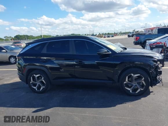 ✅ 2022 Hyundai Tucson SEL • VIN: 5NMJF3AE2NH044474 • Lot: 43467039. Wystawiony na IAAI z przebiegiem 34 861 mil. Bezpłatny archiwum sprzedaży aukcyjnych z USA i szczegółowy raport historii pojazdu na DreamBid. Zdjęcie 14.