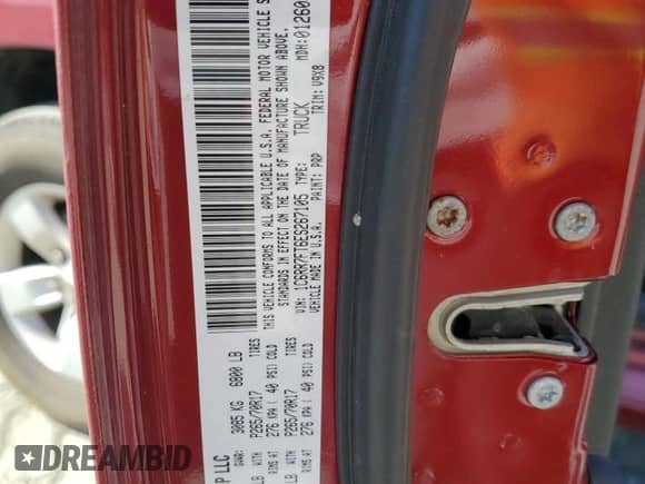 2014 Ram 1500 Express z VIN 1C6RR7FT6ES267105, wystawiony jako Copart lot #82538935 z przebiegiem 70 290 mil mil oraz Szkoda całkowita • Salvage title. Historia ofert i sprzedaży dostępna na DreamBid. Obrazek 13.