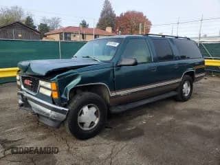 ✅ 1996 GMC Suburban • VIN: 3GKFK16R7TG515789 • Лот: 86544995. Опубликован ранее на Copart с пробегом 142 180 миль. Бесплатный доступ к архиву аукционных продаж из США и подробный отчёт об истории автомобиля на DreamBid. Изображение 1.