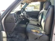 ✅ 2003 Chevrolet Silverado 1500 Work Truck • VIN: 1GCEC14X63Z153945 • Лот: 81243164. Опубликован ранее на Copart с пробегом Не указан. Бесплатный доступ к архиву аукционных продаж из США и подробный отчёт об истории автомобиля на DreamBid. Изображение 7.