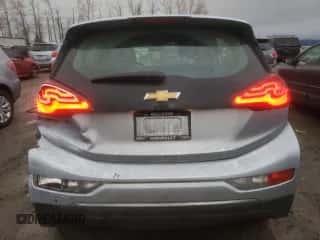 2018 Chevrolet Bolt EV LT z VIN 1G1FW6S09J4120195, wystawiony jako Copart lot #40222154 z przebiegiem 86 735 mil mil oraz . Historia ofert i sprzedaży dostępna na DreamBid. Obrazek 6.