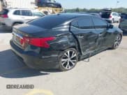 ✅ 2017 Nissan Maxima Platinum • VIN: 1N4AA6AP6HC401584 • Lot: 43244633. Listed on IAAI with 101,577 mi. Free auction sales archive from the USA and detailed vehicle history report at DreamBid. Image 4.