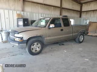 2000 Chevrolet Silverado 1500 LS z VIN 2GCEK19T7Y1333198, wystawiony jako Copart lot #65613165 z przebiegiem 174 917 mil mil oraz Czysty tytuł • Clean title. Historia ofert i sprzedaży dostępna na DreamBid. Obrazek 1.