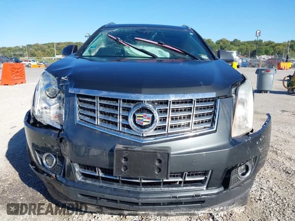 ✅ 2016 Cadillac SRX Performance Collection • VIN: 3GYFNCE35GS534785 • Lot: 43384549. Wystawiony na IAAI z przebiegiem 92 304 mil. Bezpłatny archiwum sprzedaży aukcyjnych z USA i szczegółowy raport historii pojazdu na DreamBid. Zdjęcie 12.