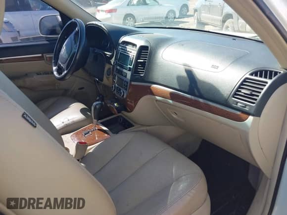 2009 Hyundai Santa Fe SE z VIN 5NMSH73E19H306557, wystawiony jako IAAI lot #43292810 z przebiegiem 168 629 mil mil oraz . Historia ofert i sprzedaży dostępna na DreamBid. Obrazek 5.