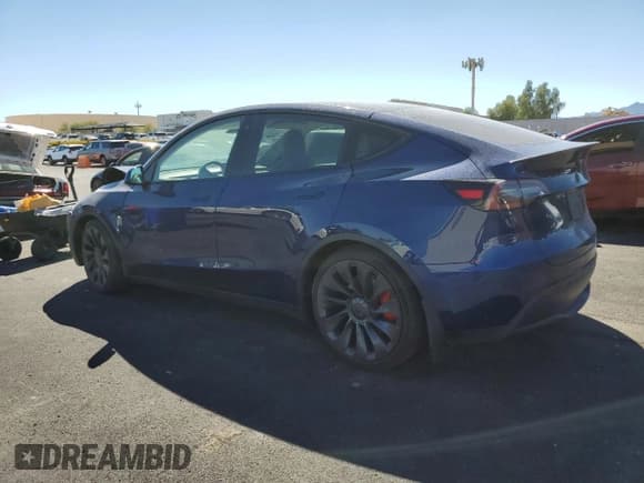 ✅ 2022 Tesla Model Y Performance • VIN: 7SAYGDEF8NF406574 • Lot: 80165595. Listed on Copart with 83,261 mi. Free auction sales archive from the USA and detailed vehicle history report at DreamBid. Image 2.
