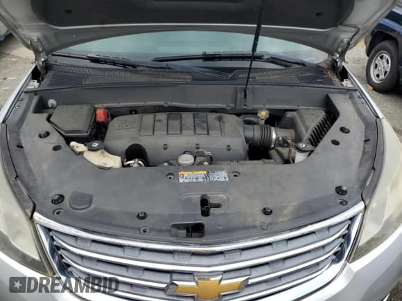 ✅ 2013 Chevrolet Traverse LT • VIN: 1GNKVGKD5DJ166055 • Lot: 65411295. Wystawiony na Copart z przebiegiem 186 585 mil. Bezpłatny archiwum sprzedaży aukcyjnych z USA i szczegółowy raport historii pojazdu na DreamBid. Zdjęcie 12.