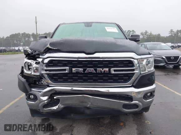 2023 Ram 1500 Lone Star with VIN 1C6RREMT4PN664918, listed as a IAAI auction lot 42942757 with 38,062 mi miles and . Bid and sale history available at DreamBid. Image 12.