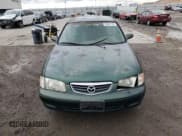 ✅ 2001 Mazda 626 LX • VIN: 1YVGF22C215245817 • Лот: 80491144. Опубликован ранее на Copart с пробегом 147 603 миль. Бесплатный доступ к архиву аукционных продаж из США и подробный отчёт об истории автомобиля на DreamBid. Изображение 5.