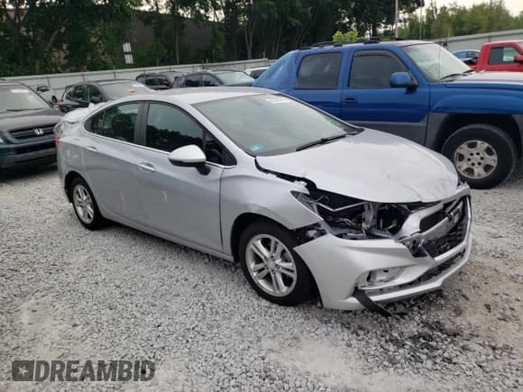 ✅ 2018 Chevrolet Cruze LT • VIN: 1G1BE5SM0J7238116 • Lot: 61329763. Listed on Copart with 74,507 mi. Free auction sales archive from the USA and detailed vehicle history report at DreamBid. Image 4.