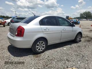 ✅ 2006 Hyundai Accent GLS • VIN: KMHCN46C46U060741 • Лот: 59560575. Опубликован ранее на Copart с пробегом 93 966 миль. Бесплатный доступ к архиву аукционных продаж из США и подробный отчёт об истории автомобиля на DreamBid. Изображение 3.
