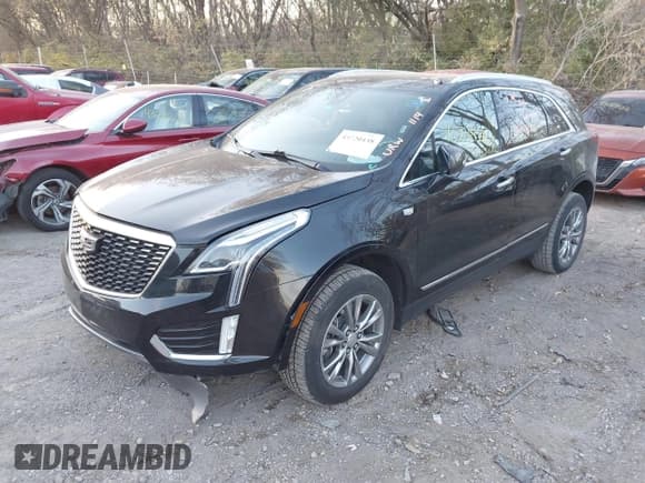 ✅ 2023 Cadillac XT5 AWD Premium Luxury • VIN: 1GYKNDRS4PZ156337 • Lot: 43720438. Listed on IAAI with 74,649 mi. Free auction sales archive from the USA and detailed vehicle history report at DreamBid. Image 17.