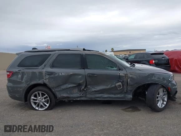 ✅ 2023 Dodge Durango GT Plus • VIN: 1C4RDJDGXPC571352 • Lot: 43682016. Listed on IAAI with 62,029 mi. Free auction sales archive from the USA and detailed vehicle history report at DreamBid. Image 12.