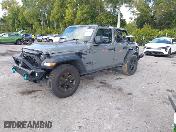 ✅ 2023 Jeep Wrangler Sport • VIN: 1C4HJXDG2PW677154 • Lot: 43756077. Listed on IAAI with 35,896 mi. Free auction sales archive from the USA and detailed vehicle history report at DreamBid. Image 2.