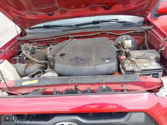 ✅ 2015 Toyota Tacoma • VIN: 3TMLU4EN5FM188212 • Lot: 42319990. Listed on IAAI with 105,691 mi. Free auction sales archive from the USA and detailed vehicle history report at DreamBid. Image 10.