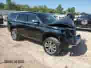 2015 Chevrolet Tahoe LTZ with VIN 1GNSKCKC6FR170659, listed as a Copart auction lot 69412835 with 252,198 mi miles and Salvage title. Bid and sale history available at DreamBid. Image 4.
